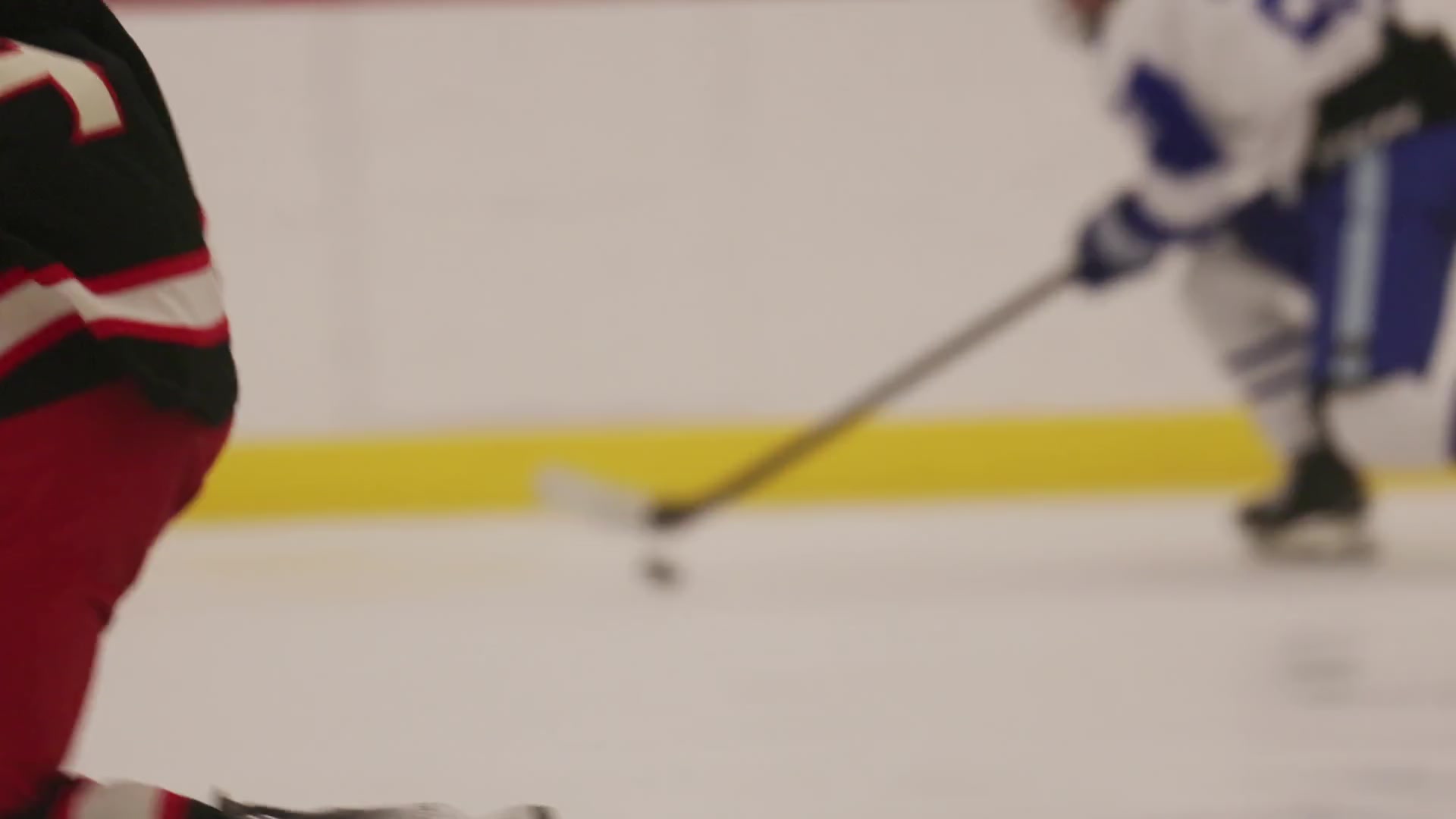 Princeton Day School hockey players rush the puck up the ice, score, and celebrate.